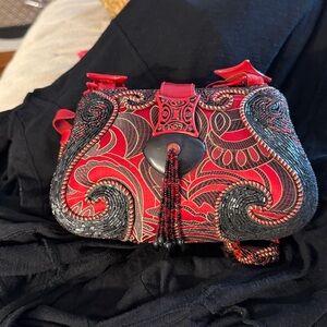 Mary Frances Red and Black Beaded shoulder bag
With beaded shoulder strap